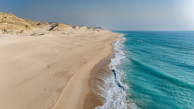 Endless sand dunes meet the Indian Ocean in Eyl, revealing the natural landscape of Puntland, Somalia