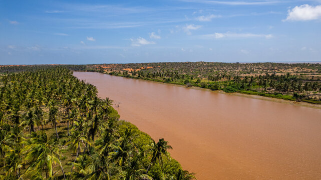 Aerial view of the Juba river winding through green landscapes in Jubaland, capturing the natural flow and surroundings