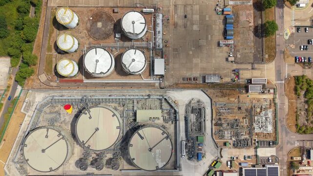 Aerial View of Petroleum Refinery and Oil Storage Tank Farm with Fuel Silos in the UK