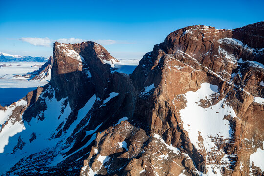 Mountain tops peeking out of the glaciers of Queen Maud Land, Antarctica