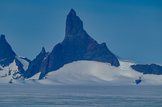 Mountain tops peeking out of the glaciers of Queen Maud Land, Antarctica