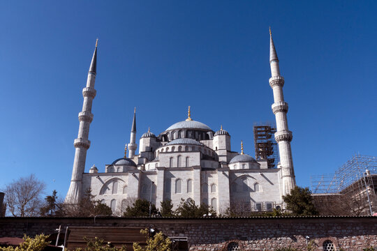 View of the Blue Mosque with minarets and detailed architecture in Istanbul, Turkey during a clear day