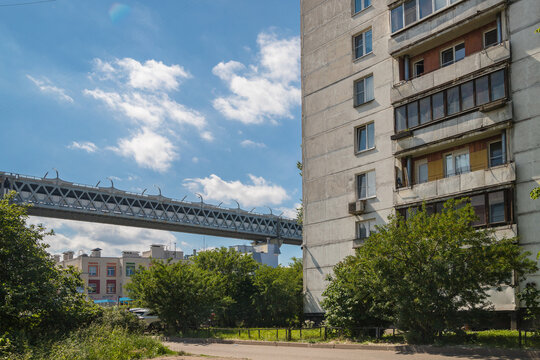 An apartment building and the Western High-speed diameter on Kanonerskiy Island. Saint-Petersburg
