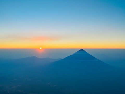 Agua Volcano seen from the top of Acatenango at sunrise, borders of Chimaltenango, Escuintla and Sacatepequez departments, Guatemala