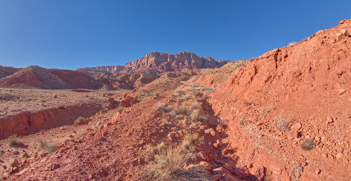 Explore paths along the Sun Valley Mine Trail with stunning views of red rock formations in Arizona's landscape
