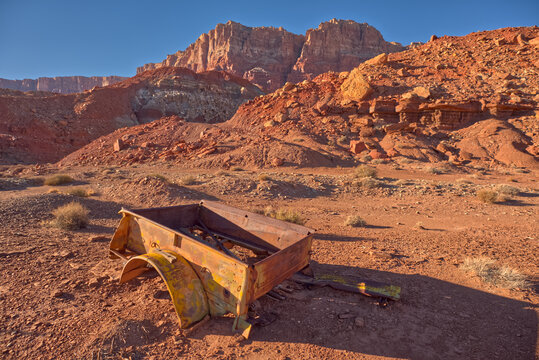 Rusty automotive relics rest along the Sun Valley Mine Trail in Arizona's unique landscape