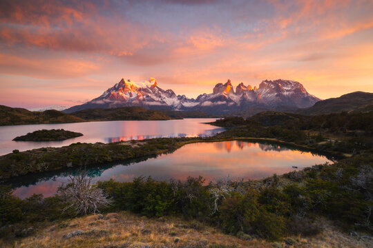 Sunrise over Lake Pehoe with Cuernos del Paine in the distance at Torres del Paine National Park in Chile