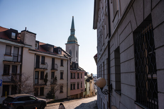 View of Michaels Gate from a quiet street in Bratislava's Old Town during the day light