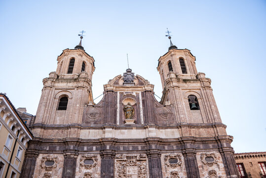 Twin towers of Santa Isabel de Portugal rise in the historic center of Zaragoza, exhibiting Baroque style from the 17th century