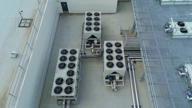 Aerial Detail of Rooftop Industrial Air Conditioning Units and Chillers on data center roof Facility