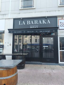 Royan, France - May 31, 2026: Charente-Maritime. Nouvelle-Aquitaine. La Baraka restaurant facade in Royan, France with outdoor seating and signage for bar and dining services
