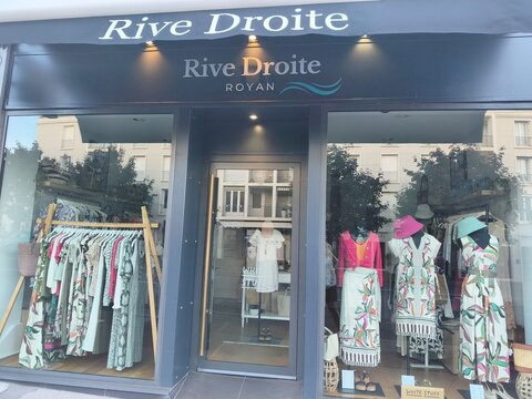 Royan, France - May 31, 2026: Charente-Maritime. Nouvelle-Aquitaine. Rive Droite boutique storefront displaying colorful women's clothing and accessories in Royan, France, with elegant window design