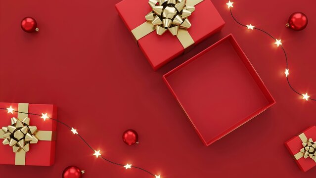 Red Christmas gift boxes with gold ribbons and fairy lights on a festive red background.