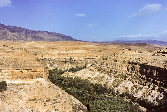 Landscape of Oued El Abiod with hills and valleys in the Aurs Mountains of Algeria during daytime