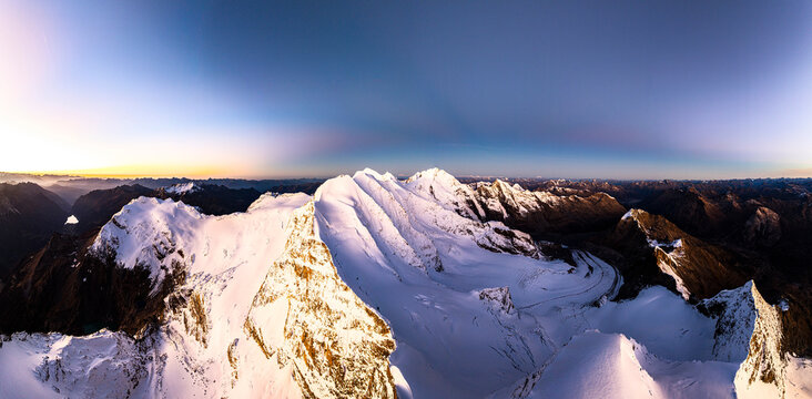 Snowy peaks Piz Palu and Piz Bernina at twilight, Engadin, Graubunden, Switzerland