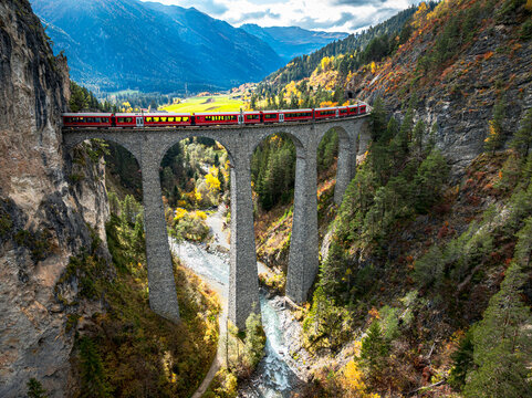 Bernina Express train winding on Landwasser Viaduct, Filisur, Graubunden, Switzerland