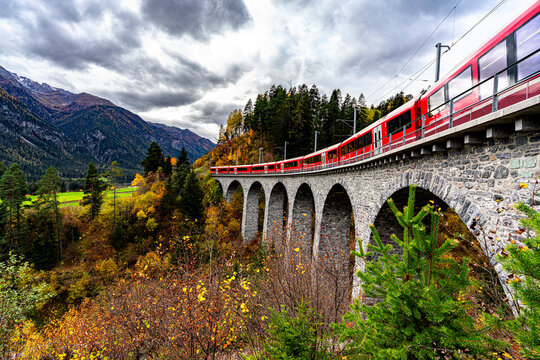 Red Bernina Express train on viaduct, Filisur, Graubunden, Switzerland
