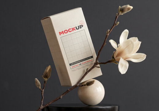 Packaging Box Mockup with Magnolia Flower and Ball