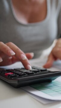 Woman Managing Family Budget At Home Close-Up Vertical Video