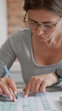 Woman Accountant Working Remotely From Home Vertical Video
