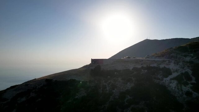 An observation deck mountain on serpentine road in Panorama Llogora near Vlora and Zeus mountain, amazing scenery view. Aerial panoramic drone view from above, top view from drone. 

