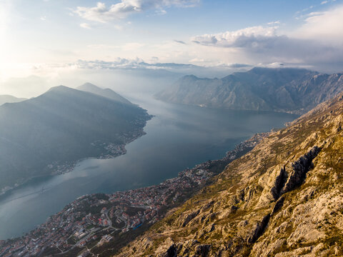 panoramic view of the bay of kotor with sunbeams through clouds