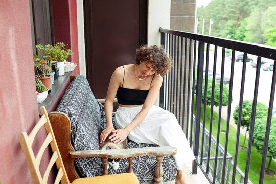 a woman with cat at home