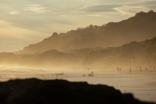 Golden Sunset Over Beach Silhouettes in Santa Teresa, Costa Rica