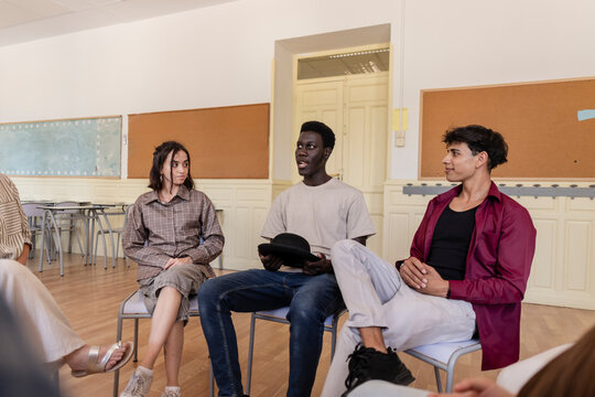 Diverse students participating in a collaborative group discussion