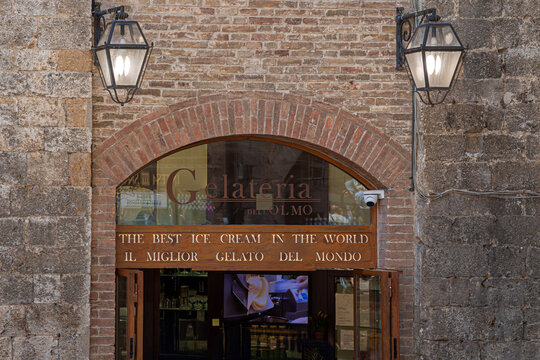 San Gimignano SI, Tuscany, Italy - May 24, 2026: Piazza Della Cisterna, Gelateria dell OLMO, one of the most famous gelato in the world in 2024.