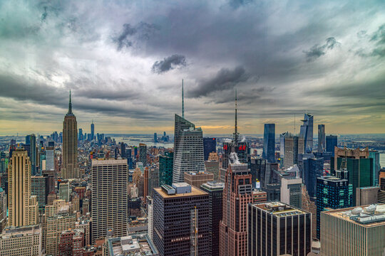 New York, USA - March 6, 2020: View from the Top of the Rock Empire state building with midtown and lower Manhattan in afternoon light.
