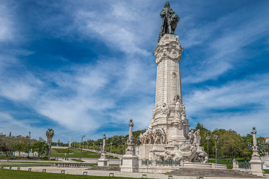 Lisbon, Portugal-April 11, 2024:Marqu&ecirc;s de Pombal Square (Pra&ccedil;a Marqu&ecirc;s de Pombal) with the bronze statue dedicated to Sebasti&atilde;o Jos&eacute; de Carvalho (Marquis of Pombal).Eduardo VII Park in the background