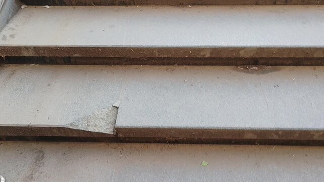 Dusty stairs in an urban setting with urban decay and neglect