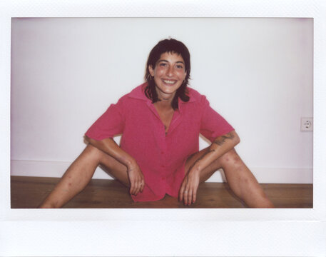 UGC Polaroid of Smiling woman in pink shirt