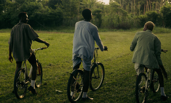 Three Friends with Bicycles.