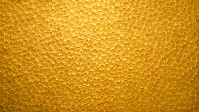 Hammered gold metal surface textured luxury metallic background