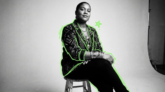 Poised woman poses on a stool traced in a glowing illustrated neon green outline