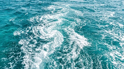 Fototapeta premium Turquoise ocean water wake with white foam, churning sea surface behind a boat, tropical blue water texture for travel backgrounds isolated PNG with Transparent Background