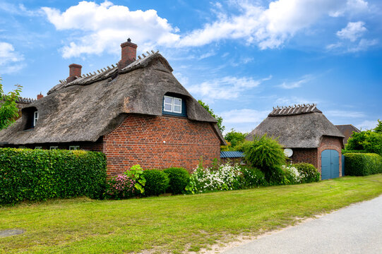 Traditional thatched-roof houses in the popular vacation village of Reetdorf Geltinger Birk