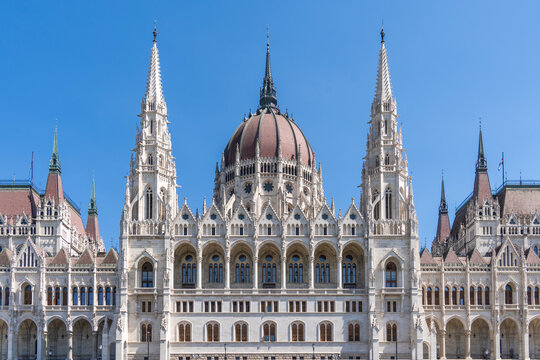 The neo-Gothic building of the Hungarian Parliament on the banks of the Danube in Budapest