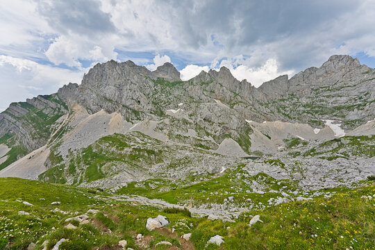 Durmitor National Park mountain landscape with rocky green hills and clouds