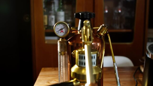 Slow cinematic boom up over a vintage La Pavoni coffee lever espresso machine