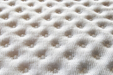Fototapeta premium White quilted fabric texture with soft dimpled pattern for bedding or upholstery background
