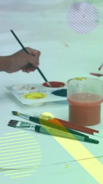 Children painting with brushes and palette over colorful shapes animation