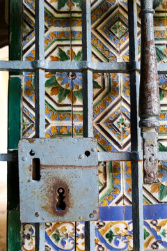 Rusty Wrought iron gate with latch