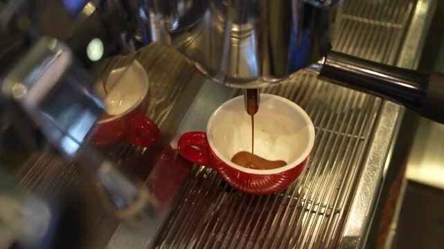 Espresso coffee extraction into ceramic cup