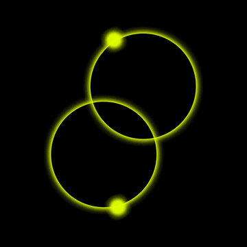 Abstract glowing yellow circles with bright light points isolated on a solid black background