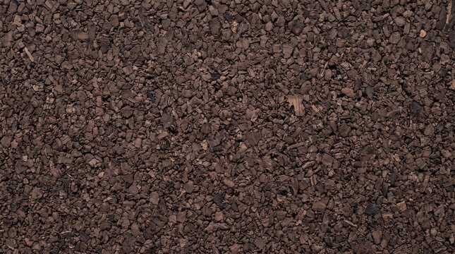 Dark Brown Granulated Cork Surface Texture Background