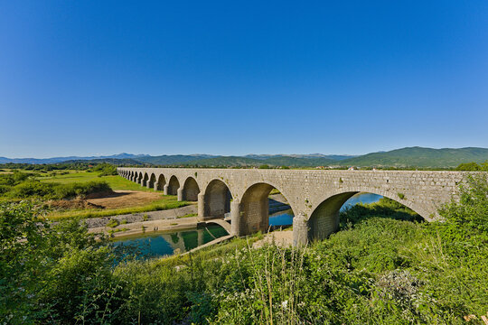 Tsar Bridge in Niksic, Montenegro, historic arch bridge over Moraca river