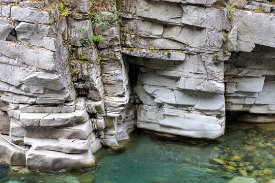 Layered Granite Cliffs and Turquoise River at Othello Tunnels in Hope, BC, Canada